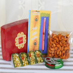 Rakhi With Sweets - Masala Cashew with Dry Fruit Cakes Sweets and Rudraksha Rakhi