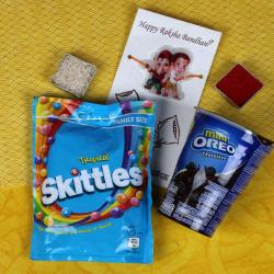 Rakhi Gift Hampers - Skittles Chocolate and Mini Oreo Biscuits Kids Rakhi Combo