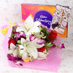 Rudraksha Rakhis - Mix Exotic Bouquet with Cadbury Celebration Chocolate and Rakhi