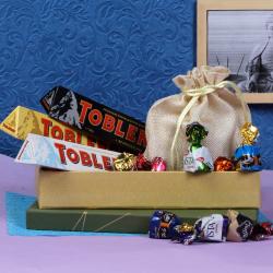 Send Chocolates Gift Three Toblerone Chocolate Bars with Assorted Truffle Chocolates  To Amritsar