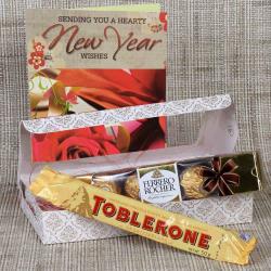 Send New Year Gift New Year Gift of Ferrero Rocher and Toblerone To Rajkot