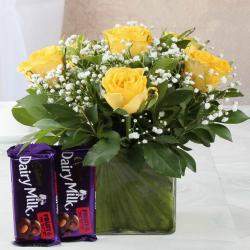 Flowers for Men - Cadbury Dairymilk Fruit n Nut Chocolate with Yellow Roses in Vase