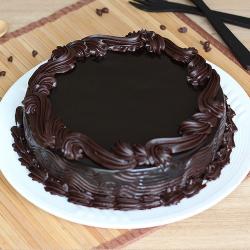 Send Round Dark Chocolate Cake To Coimbatore