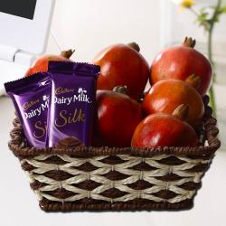 Fresh Fruits - Basket of Pomegranates with Dairy Milk Silk Chocolates