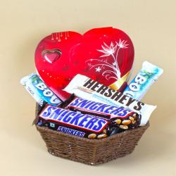 Anniversary Gourmet Gift Hampers - Basket full of Hersheys and Snickers with Heart shape Chocolate Box