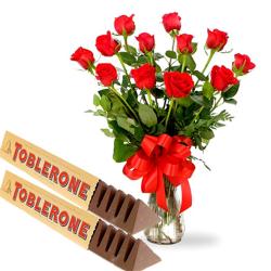 Wedding Flowers - Red Roses Arranged In Vase With Toblerone Chocolates