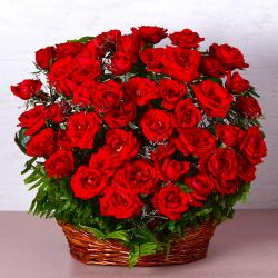 House Warming Flowers - Basket of Fifty Red Roses