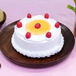 Send Cakes Gift Round Pineapple Cherry Delight Cake To Lucknow