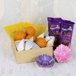 Assorted Sweets Box and Silk Chocolate with Earthen Diya for Diwali Celebration