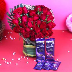 Anniversary Romantic Gift Hampers - Assorted Cadbury Chocolate with Red Roses Arrangement