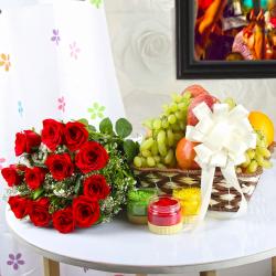 Holi Gifts - Three Holi Colors with Fresh Fruit Basket and Roses Bouquet